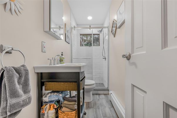 Bathroom, Glass Shower, Interior, Recessed Lighting, Wood Texture Flooring