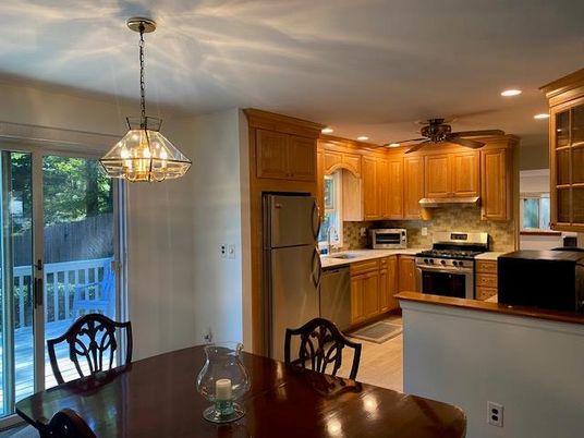 Dining room, Interior, Kitchen, Pendant Lights, Recessed Lighting, Stainless Steel Appliances, Wood Texture Flooring