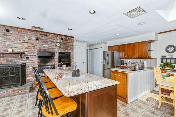 Fireplace, Interior, Kitchen, Recessed Lighting, Stone Walls