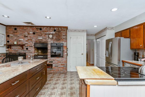 Fireplace, Interior, Kitchen, Recessed Lighting, Stone Walls