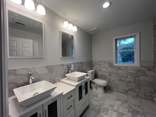 Bathroom, Dual Sink Vanities, Interior, Marble, Marble Walls, Recessed Lighting