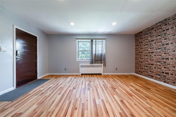 Empty room, Interior, Recessed Lighting, Stone Walls, Wood Texture Flooring