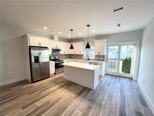 Interior, Kitchen, Pendant Lights, Recessed Lighting, Stainless Steel Appliances, Wood Texture Flooring
