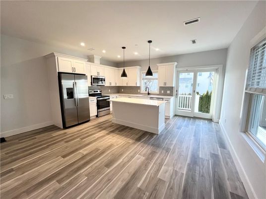 Interior, Kitchen, Pendant Lights, Recessed Lighting, Stainless Steel Appliances, Wood Texture Flooring