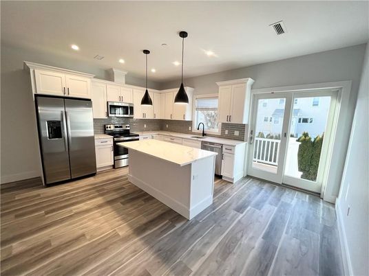 Interior, Kitchen, Pendant Lights, Recessed Lighting, Stainless Steel Appliances, Wood Texture Flooring