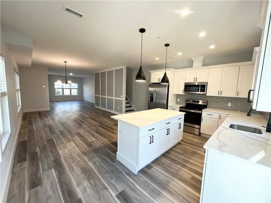 Interior, Kitchen, Pendant Lights, Recessed Lighting, Stainless Steel Appliances, Wood Texture Flooring