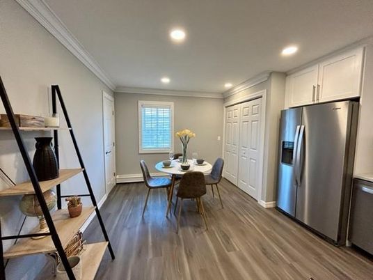 Dining room, Interior, Kitchen, Recessed Lighting, Stainless Steel Appliances, Wood Texture Flooring