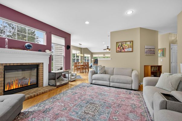Dining room, Fireplace, Interior, Living room, Recessed Lighting, Wood Texture Flooring