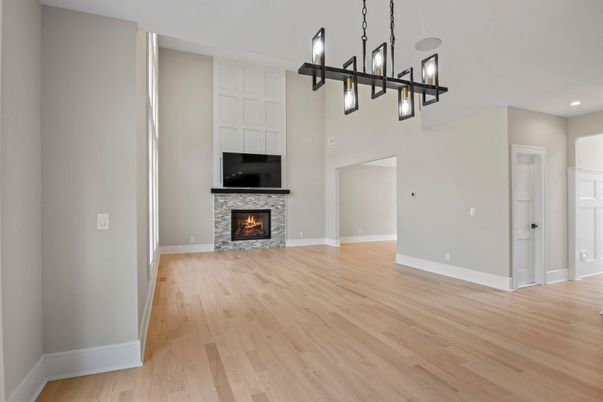 Empty room, Fireplace, Interior, Pendant Lights, Recessed Lighting, Wood Texture Flooring
