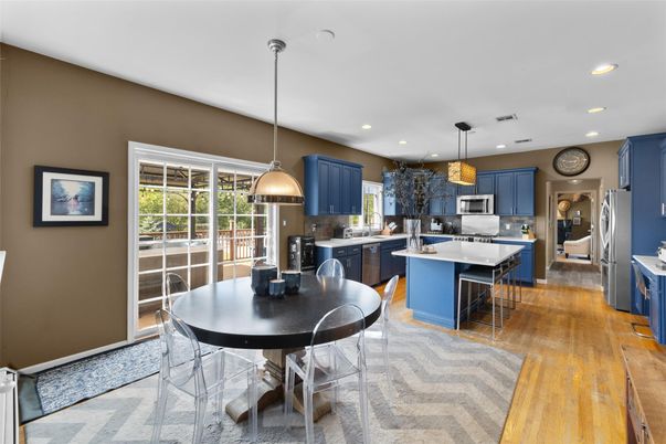 Dining room, Interior, Kitchen, Pendant Lights, Recessed Lighting, Stainless Steel Appliances, Wood Texture Flooring