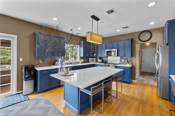Interior, Kitchen, Pendant Lights, Recessed Lighting, Stainless Steel Appliances, Wood Texture Flooring