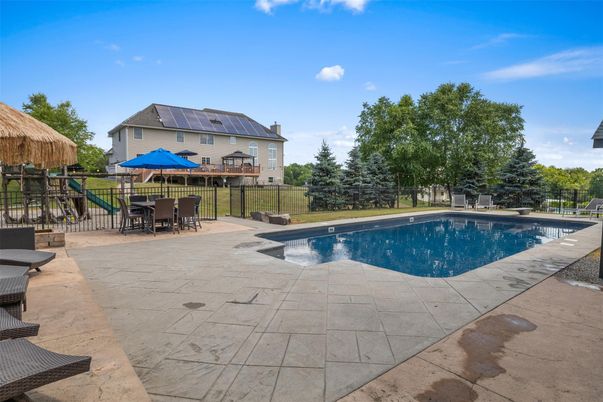 Exterior, Pool, Solar Panels