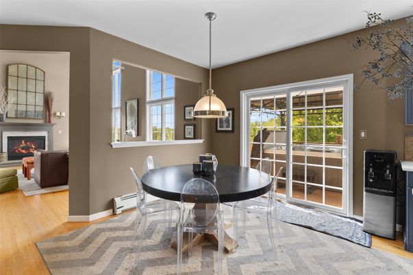 Dining room, Fireplace, Interior, Pendant Lights, Wood Texture Flooring