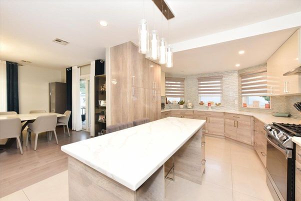 Dining room, Interior, Kitchen, Pendant Lights, Recessed Lighting, Stainless Steel Appliances, Wood Texture Flooring