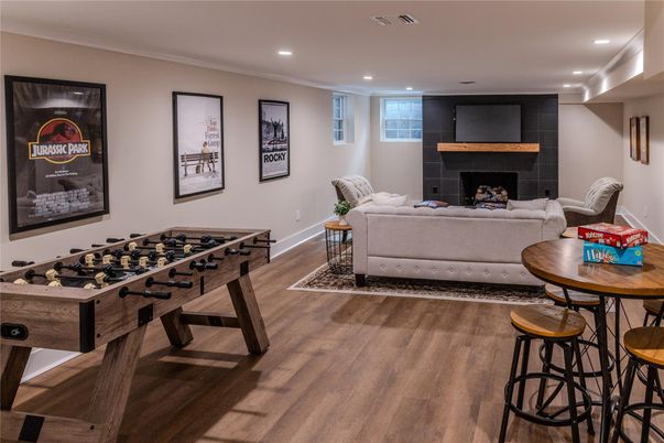 Fireplace, Game Room, Interior, Living room, Recessed Lighting, Wood Texture Flooring