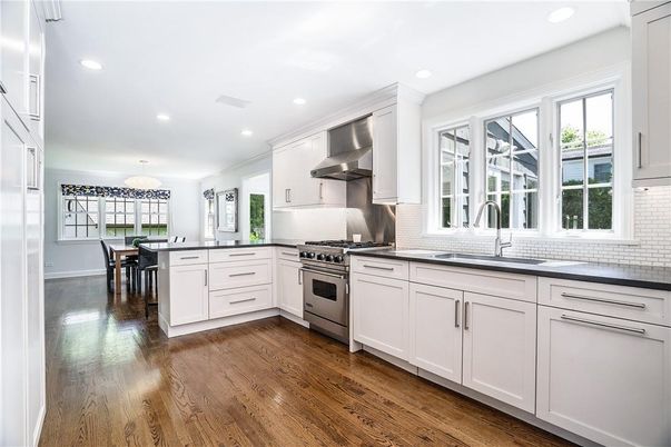 Chandelier, Dining room, Interior, Kitchen, Recessed Lighting, Stainless Steel Appliances, Wood Texture Flooring
