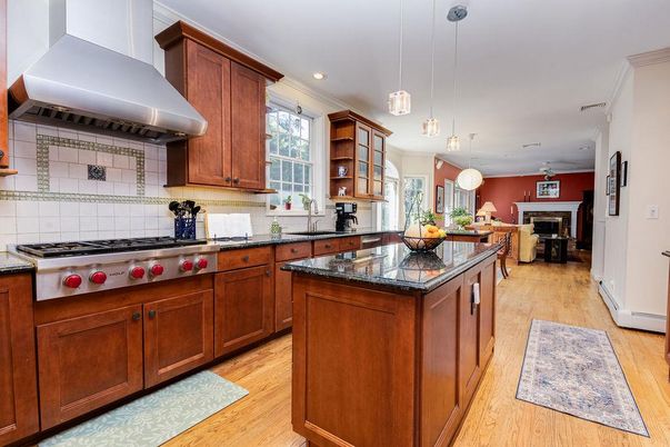 Fireplace, Interior, Kitchen, Pendant Lights, Recessed Lighting, Stainless Steel Appliances, Wood Texture Flooring