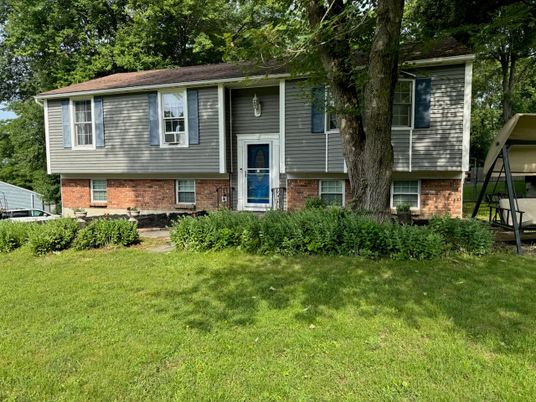 Exterior, Facade, Brick Facade, Raised Ranch