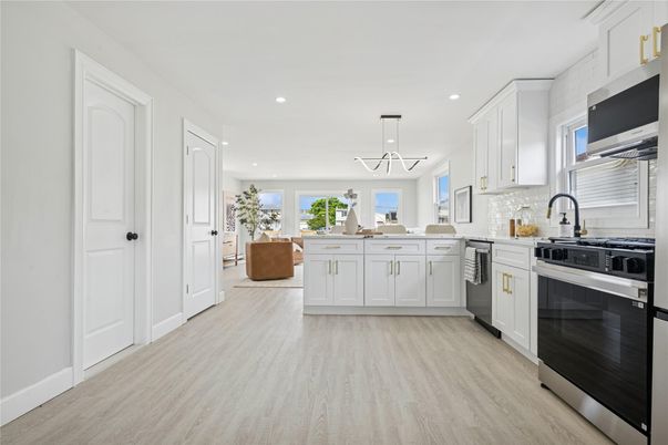 Interior, Kitchen, Pendant Lights, Recessed Lighting, Stainless Steel Appliances, Wood Texture Flooring