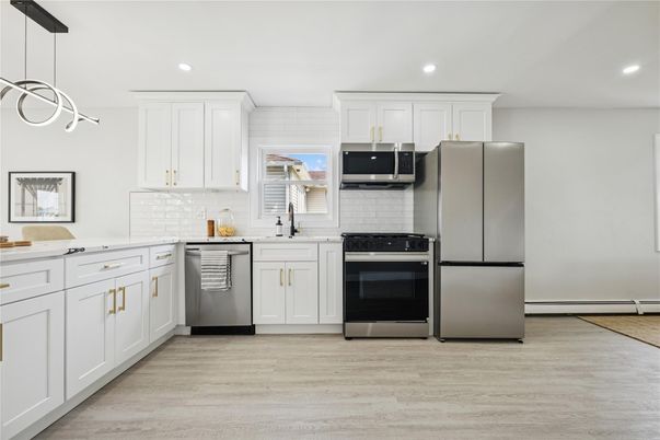 Interior, Kitchen, Pendant Lights, Recessed Lighting, Stainless Steel Appliances, Wood Texture Flooring