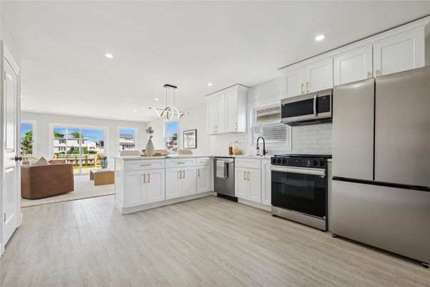 Interior, Kitchen, Living room, Pendant Lights, Recessed Lighting, Stainless Steel Appliances, Wood Texture Flooring
