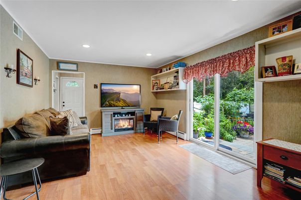 Fireplace, Interior, Living room, Recessed Lighting, Wood Texture Flooring