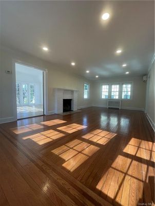 Empty room, Fireplace, Interior, Recessed Lighting, Wood Texture Flooring