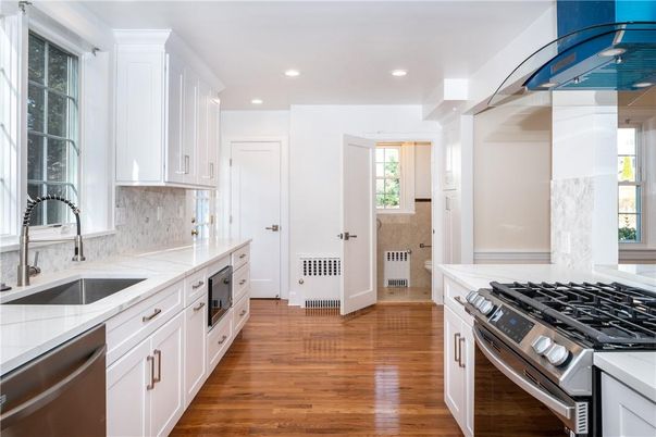 Interior, Kitchen, Recessed Lighting, Stainless Steel Appliances, Wood Texture Flooring