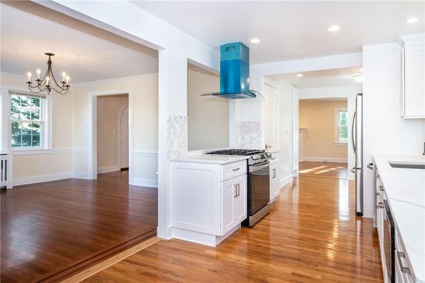 Chandelier, Interior, Kitchen, Recessed Lighting, Stainless Steel Appliances, Wood Texture Flooring