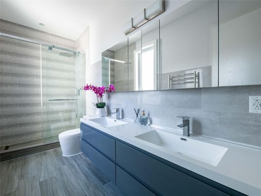 Bathroom, Dual Sink Vanities, Glass Shower, Interior, Wood Texture Flooring