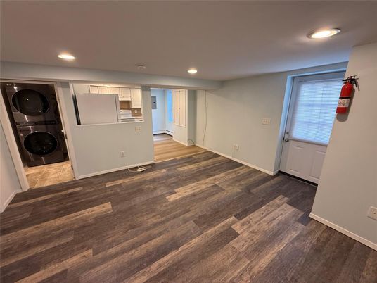 Empty room, Interior, Recessed Lighting, Utility Closets, Washer, Wood Texture Flooring