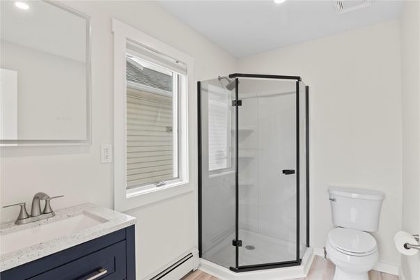 Bathroom, Glass Shower, Interior, Recessed Lighting, Wood Texture Flooring