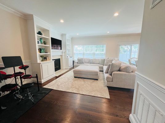 Fireplace, Fitness Equipment, Interior, Living room, Recessed Lighting, Wood Texture Flooring