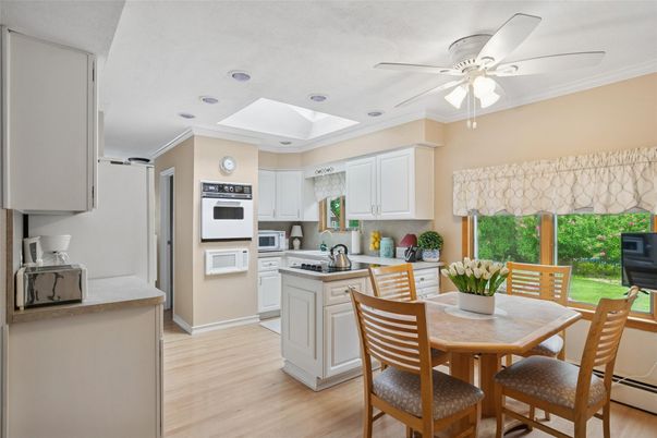 Dining room, Interior, Kitchen, Recessed Lighting, Stainless Steel Appliances, Wood Texture Flooring