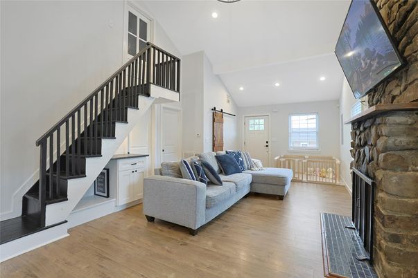 Fireplace, Interior, Living room, Recessed Lighting, Wood Texture Flooring