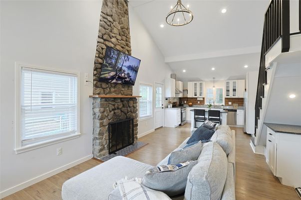 Fireplace, Interior, Kitchen, Living room, Pendant Lights, Recessed Lighting, Stone Walls, Wood Texture Flooring