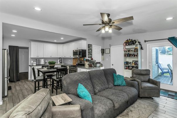 Dining room, Interior, Kitchen, Living room, Recessed Lighting, Stainless Steel Appliances, Wood Texture Flooring
