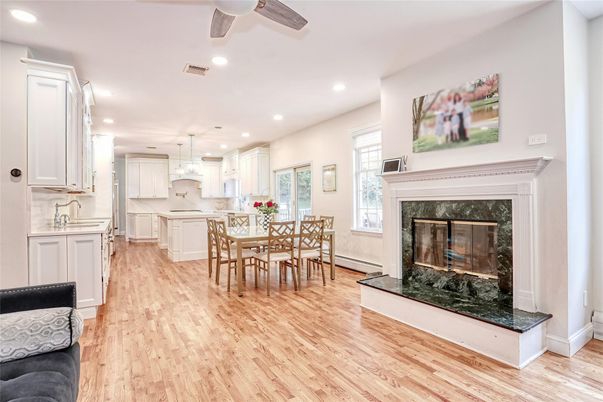 Dining room, Fireplace, Interior, Kitchen, Pendant Lights, Recessed Lighting, Wood Texture Flooring