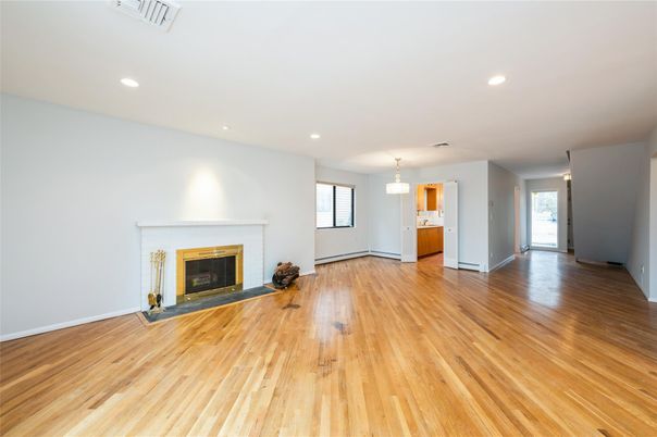 Chandelier, Empty room, Fireplace, Interior, Recessed Lighting, Wood Texture Flooring