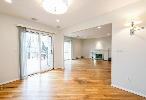 Empty room, Fireplace, Interior, Recessed Lighting, Wood Texture Flooring