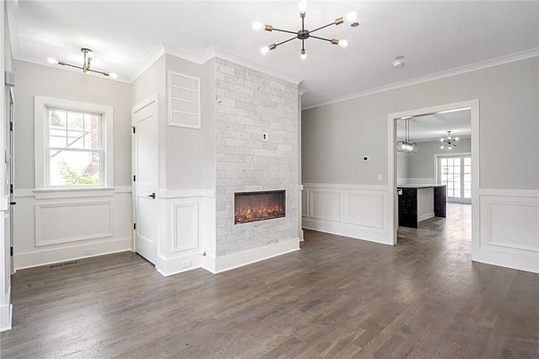 Empty room, Fireplace, Interior, Pendant Lights, Stone Walls, Wood Texture Flooring