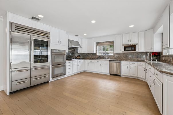 Interior, Kitchen, Recessed Lighting, Stainless Steel Appliances, Wood Texture Flooring