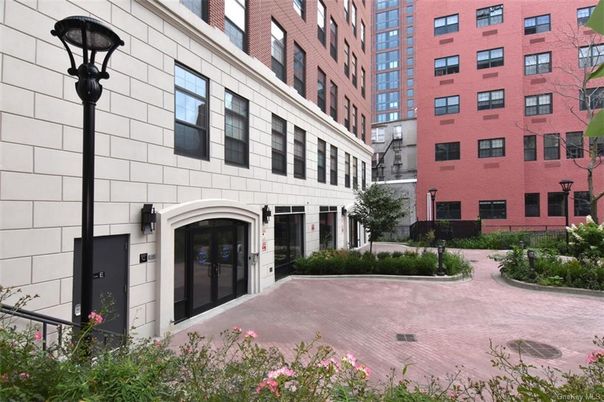 Exterior, Facade, Brick Facade, Condo Building