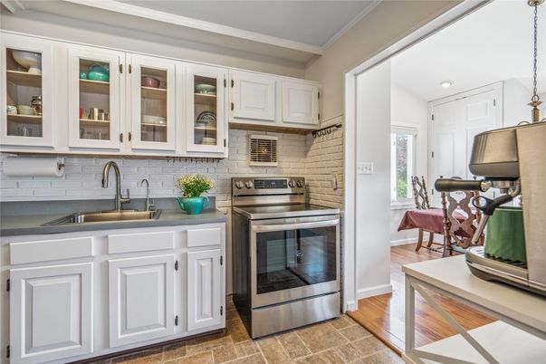 Interior, Kitchen, Recessed Lighting, Stainless Steel Appliances, Stone Walls, Wood Texture Flooring