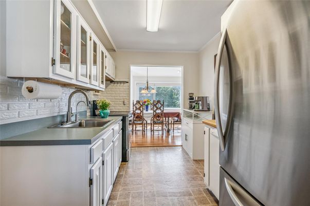 Dining room, Interior, Kitchen, Pendant Lights, Stainless Steel Appliances, Stone Walls