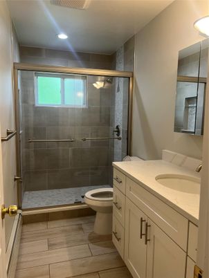Bathroom, Glass Shower, Interior, Recessed Lighting, Wood Texture Flooring