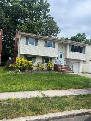 Attached, Exterior, Facade, Raised Ranch
