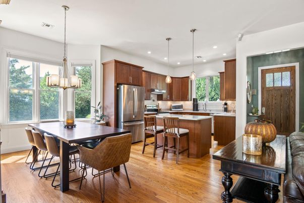 Dining room, Interior, Kitchen, Pendant Lights, Recessed Lighting, Stainless Steel Appliances, Wood Texture Flooring