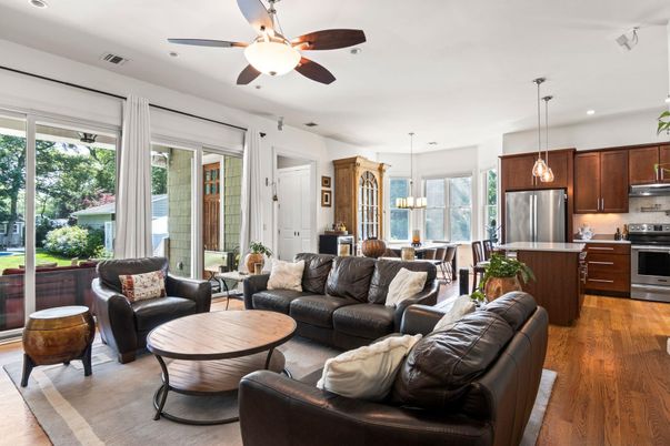 Chandelier, Dining room, Interior, Kitchen, Living room, Pendant Lights, Recessed Lighting, Stainless Steel Appliances, Wood Texture Flooring