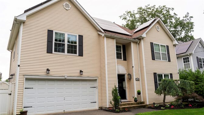 Attached, Exterior, Facade, Solar Panels, Rowhouse